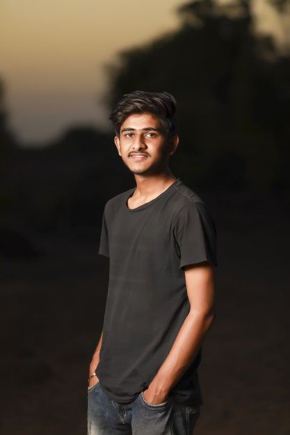 Premium Photo Young handsome indian boy wearing black t shirt